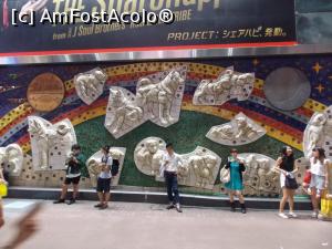 [P60] Tokyo, Shibuya, panou cu mulți Hachiko, cu soarele și luna lângă stația de tren și metrou, loc și de întâlnire » foto by mprofeanu
 - 
<span class="allrVoted glyphicon glyphicon-heart hidden" id="av756072"></span>
<a class="m-l-10 hidden" id="sv756072" onclick="voting_Foto_DelVot(,756072,7999)" role="button">șterge vot <span class="glyphicon glyphicon-remove"></span></a>
<a id="v9756072" class=" c-red"  onclick="voting_Foto_SetVot(756072)" role="button"><span class="glyphicon glyphicon-heart-empty"></span> <b>LIKE</b> = Votează poza</a> <img class="hidden"  id="f756072W9" src="/imagini/loader.gif" border="0" /><span class="AjErrMes hidden" id="e756072ErM"></span>